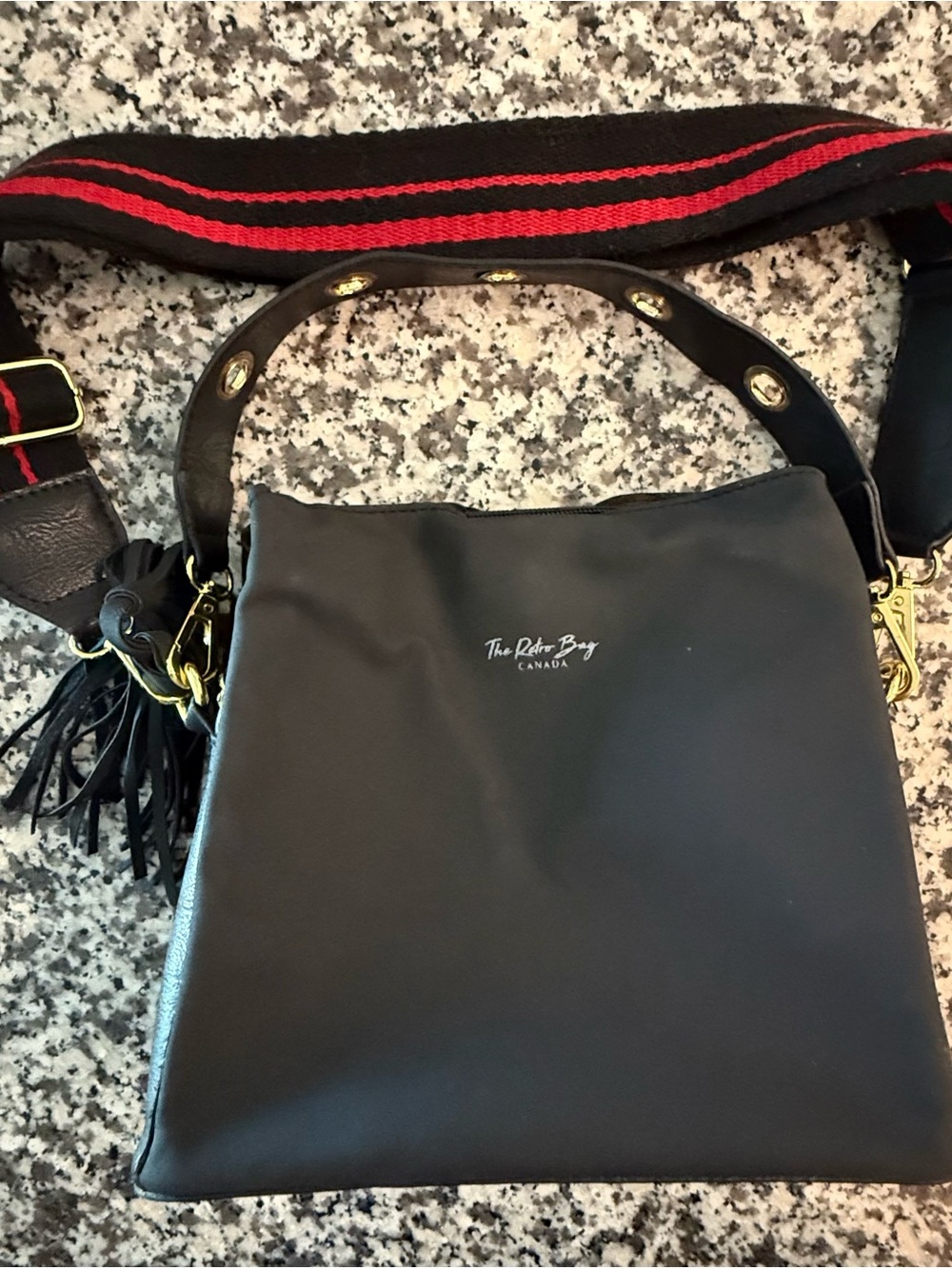 Black Crossbody Bag with Red-Striped Strap
